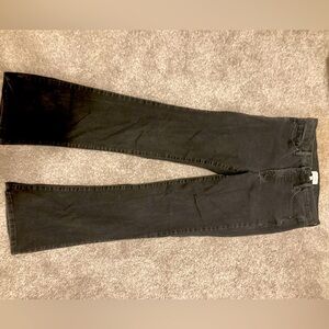 predominately black jean slack. slightly grey faded. Small bell bottom.